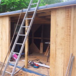 Shed alfresco. Not enough wood to make doors!